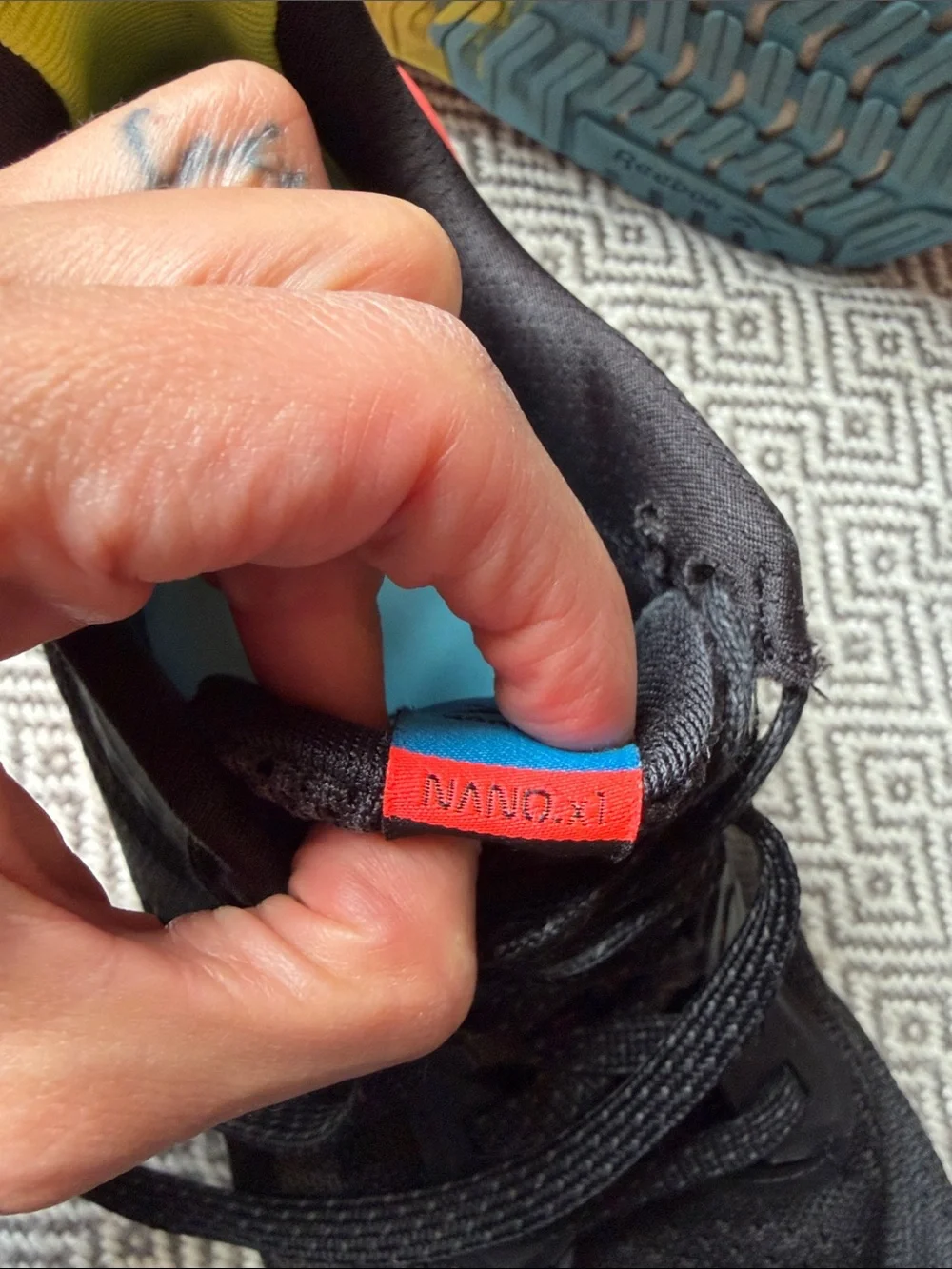 Reebok Nano X1 Black Running Shoes with Yellow, Red and Blue Accents